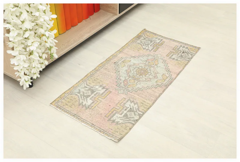 Full top view of the 1x3 vintage rose geometric doormat rug on a white background.