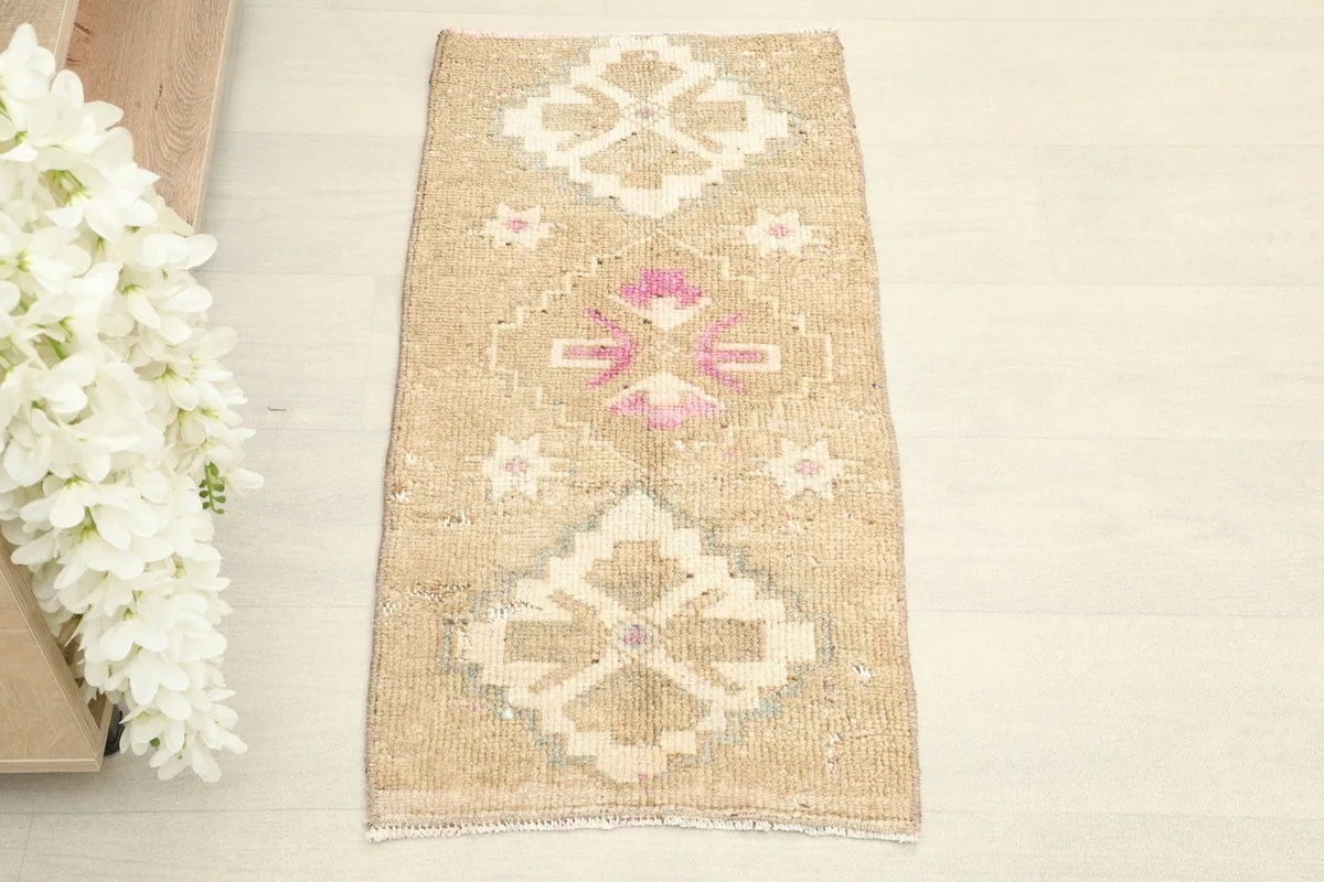 Overhead view showcasing the full pattern and colors of the hand-knotted wool rug