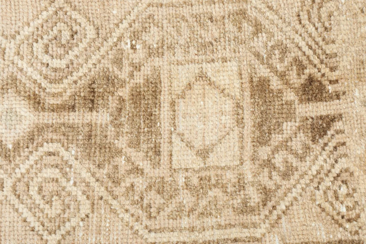 Detailed shot highlighting the subtle color variations and texture of the wool pile.