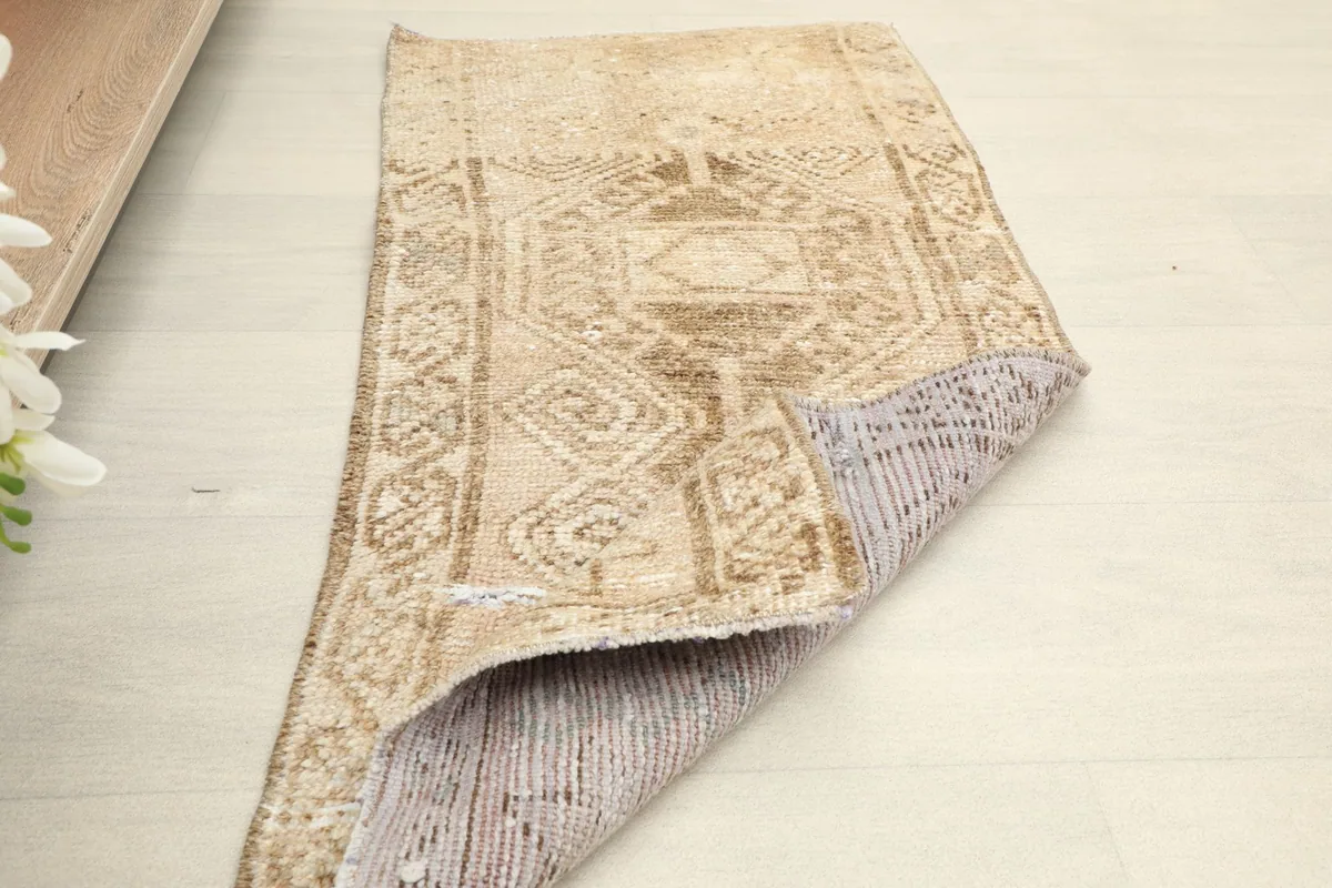 Angled view showing the front and a larger section of the rug's reverse side.