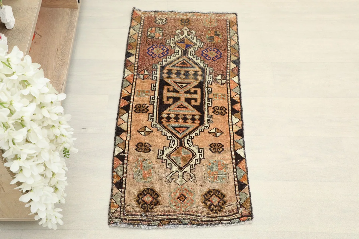 Overhead view of the vintage Anatolian rug showcasing its full design and colors