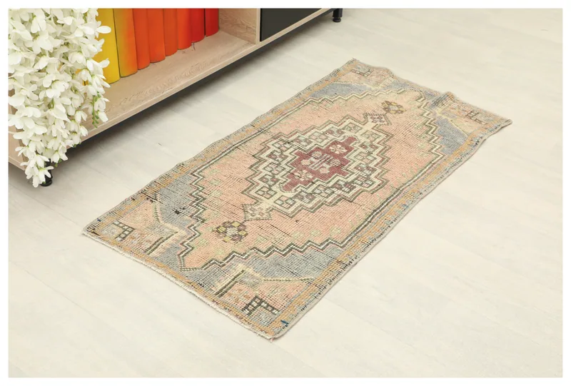 Full top view of the 1'9" x 3'7" Rose Gray Anatolian Medallion Rug on a white background.