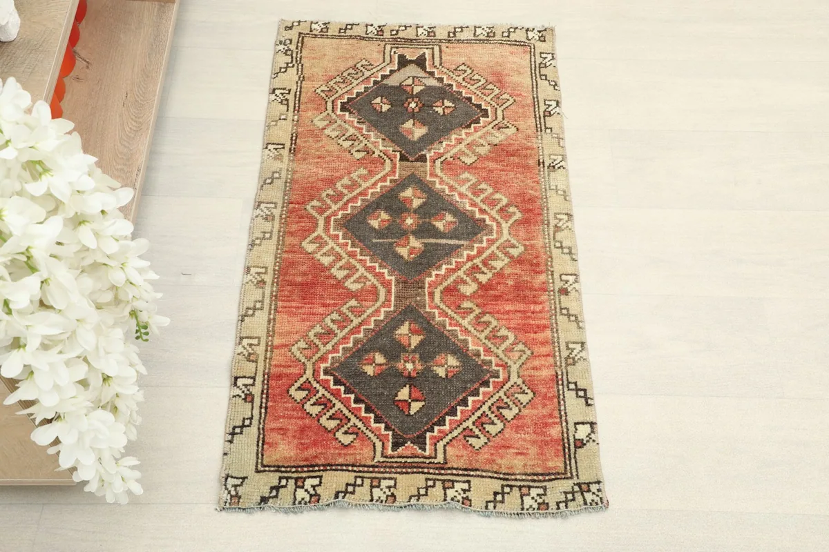 Overhead view of the hand-knotted Anatolian rug, showcasing its tribal geometric design.