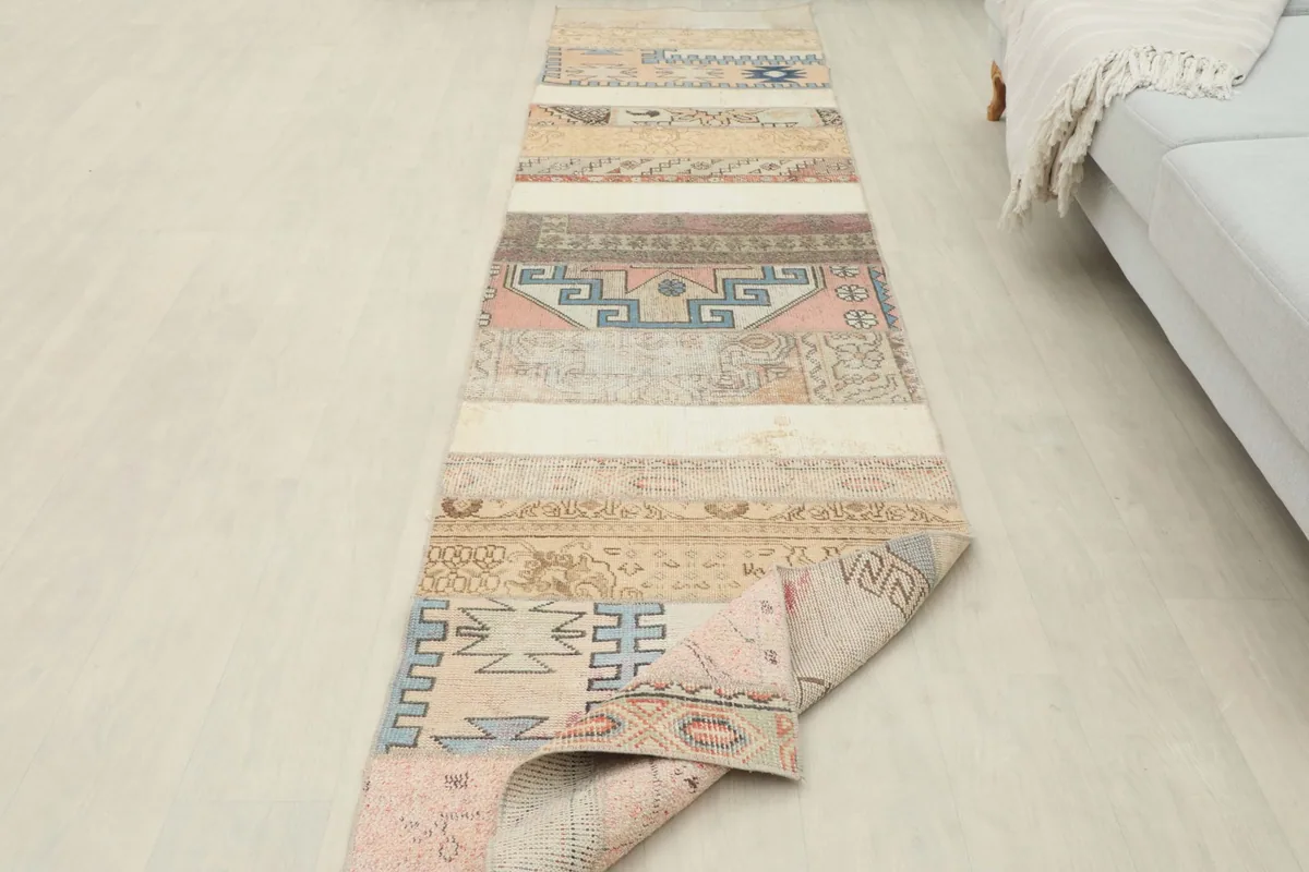 Partial view of the runner rolled up at one end, showing its flexibility and full length