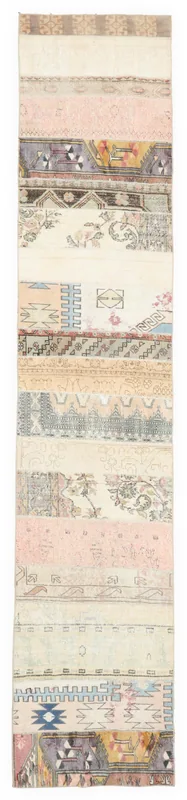 Full overhead view of the 2'7" x 13'1" vintage patchwork runner on a white background