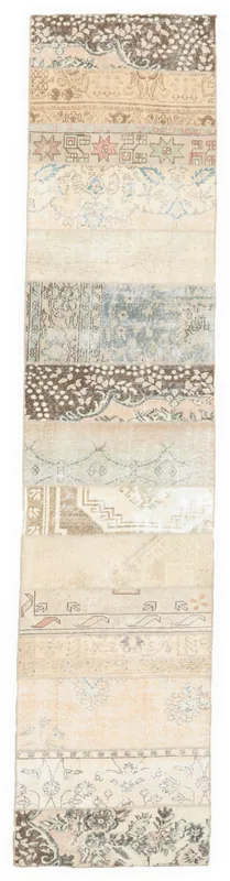 Full overhead view of the beige multicolor patchwork vintage runner on a white background