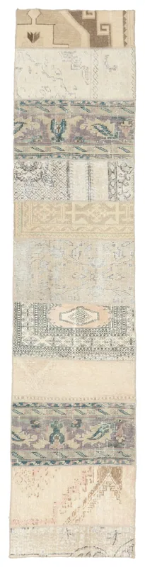 Full top view of the beige multicolor patchwork runner rug on a white background.