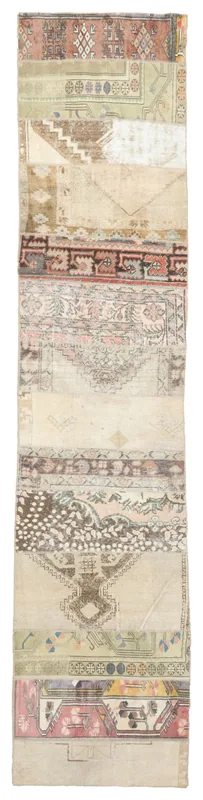 Full overhead view of the beige patchwork geometric runner on a white background