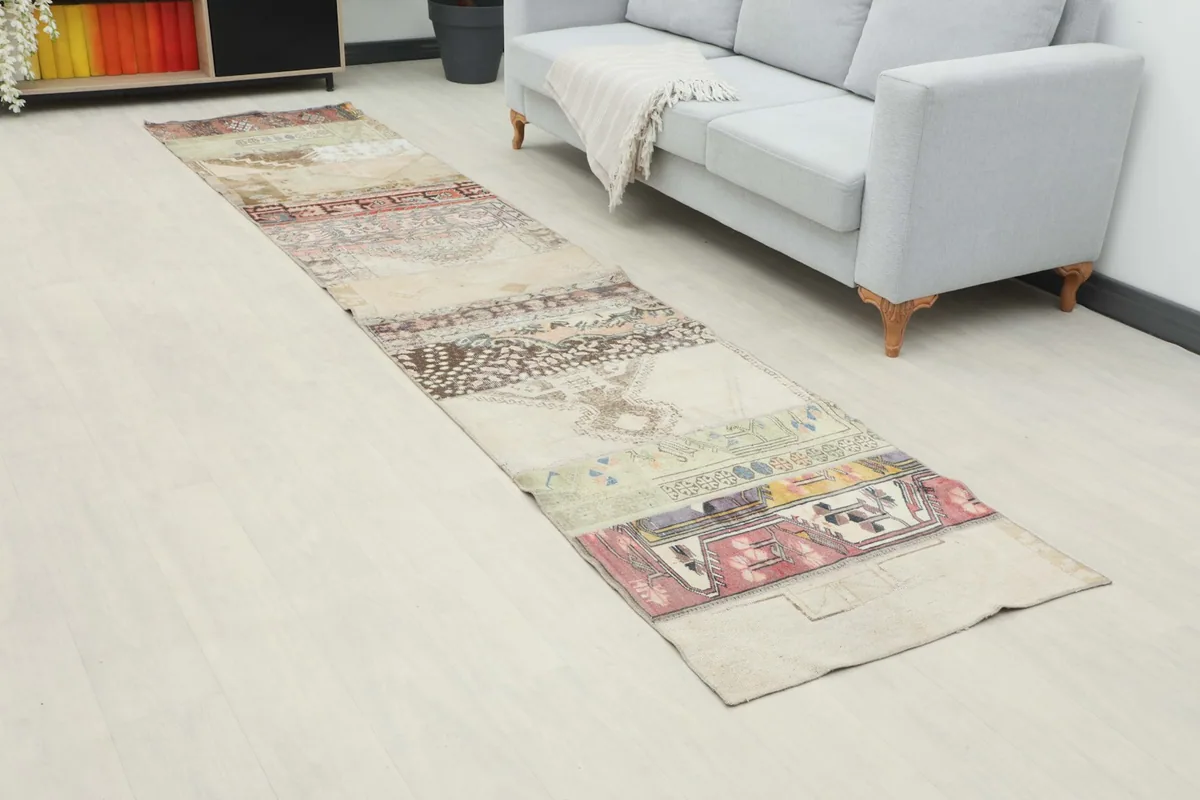 Angled view of the runner in a living space, showing its length and various pattern sections