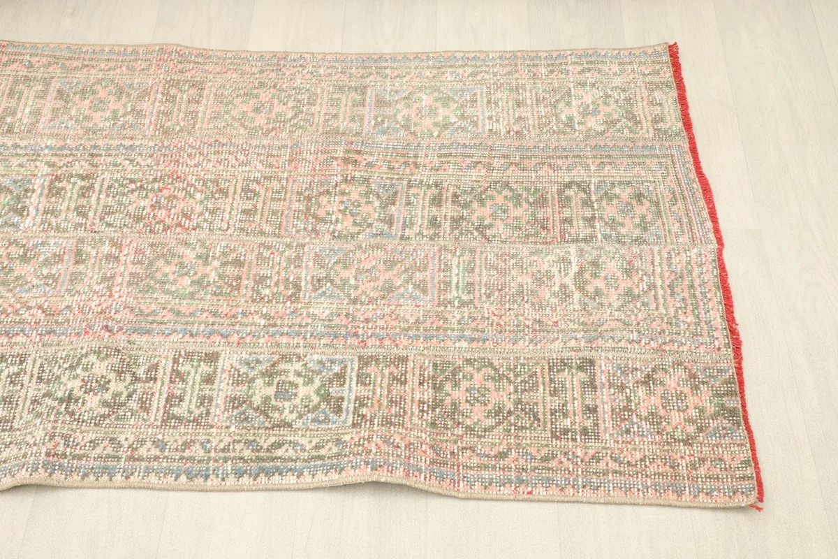 Angled shot from the opposite side, displaying the consistent pattern and condition across the rug.