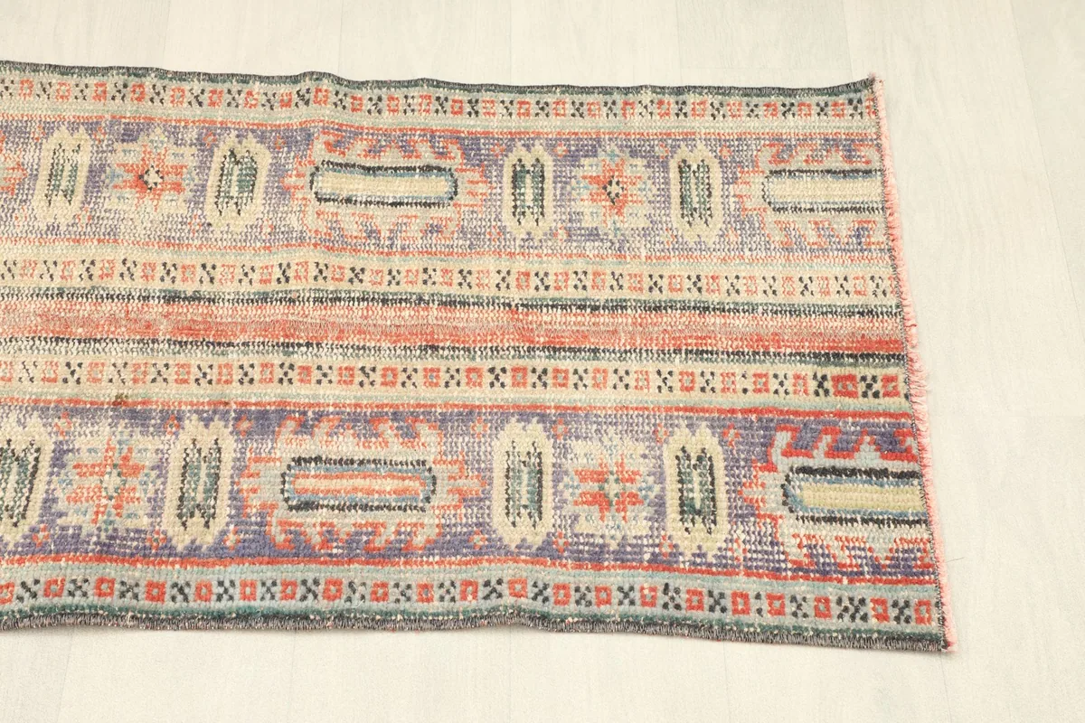 Another angled view of the runner, emphasizing the balanced design and vintage character.