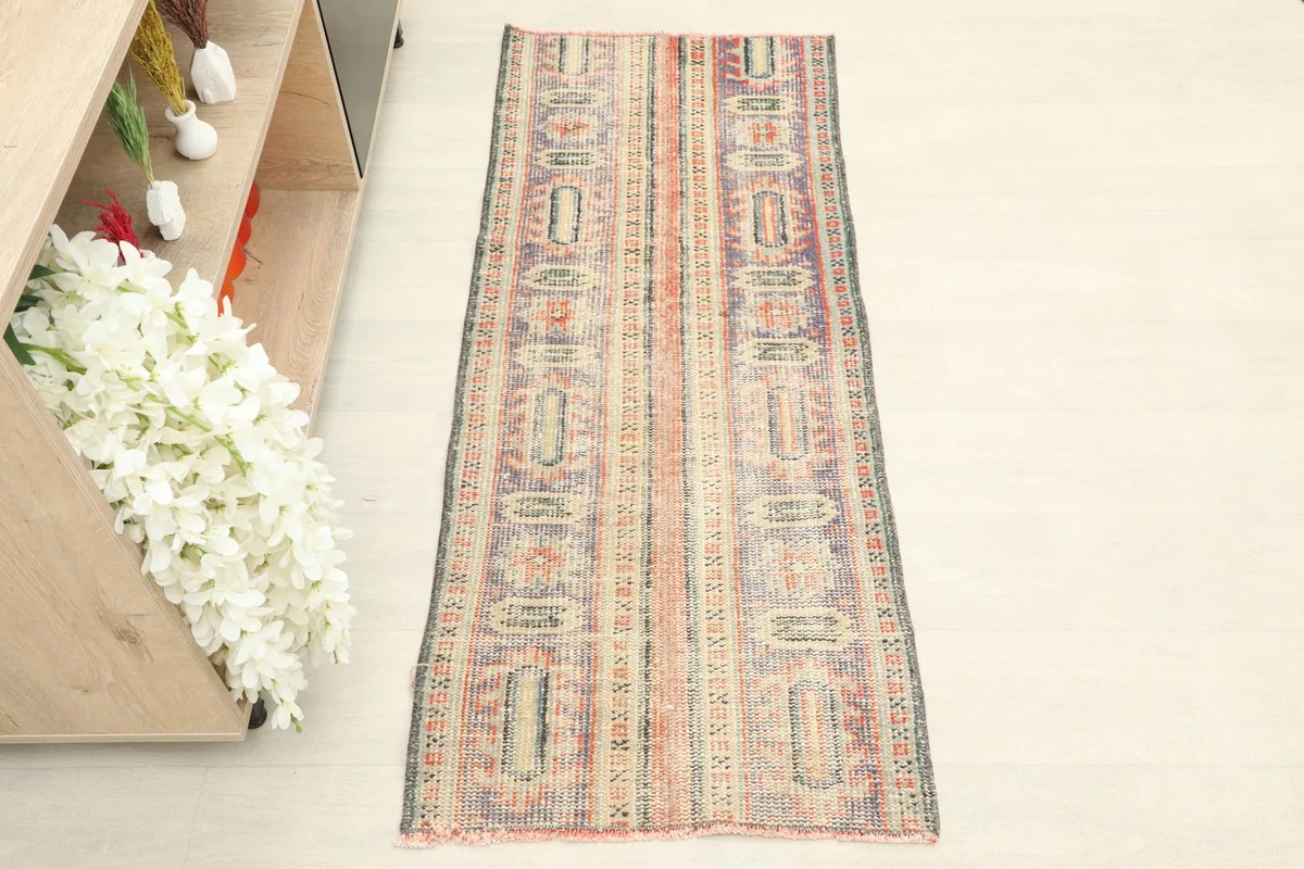 Direct overhead view of the hand-knotted wool runner, highlighting its full length and pattern.