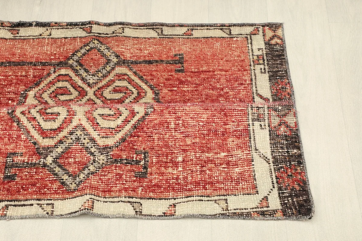 Angled perspective of the rug, emphasizing its overall shape and design from one side.