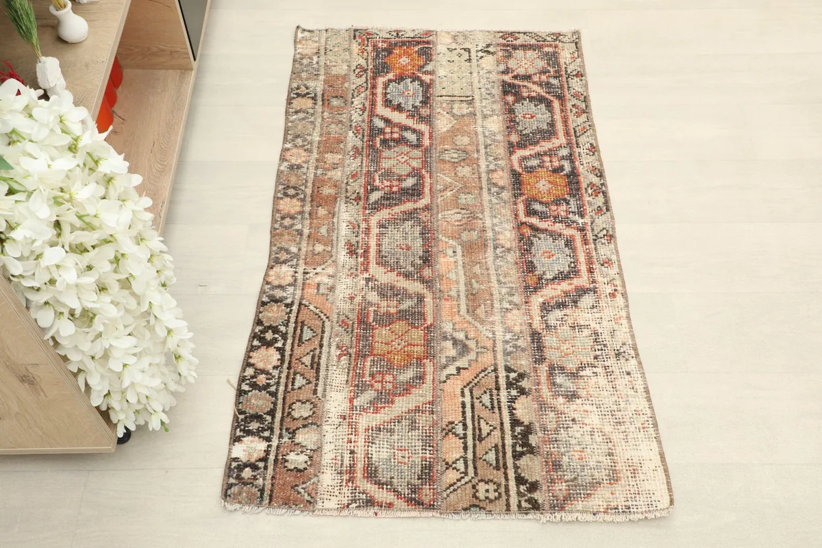 Overhead view of the hand-knotted wool rug, showing its full design and colors