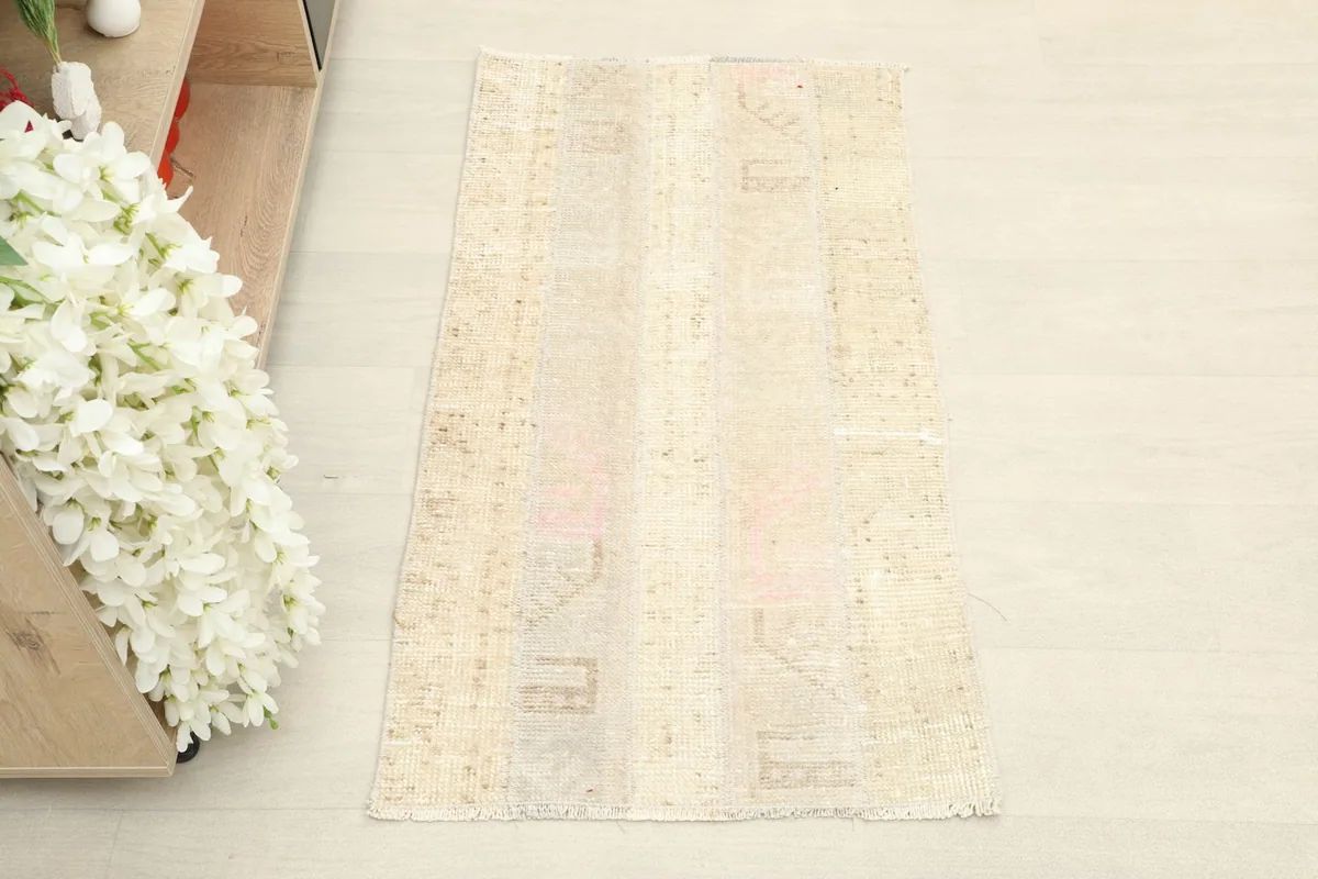 Top-down view of the vintage Anatolian rug, highlighting its subtle color variations
