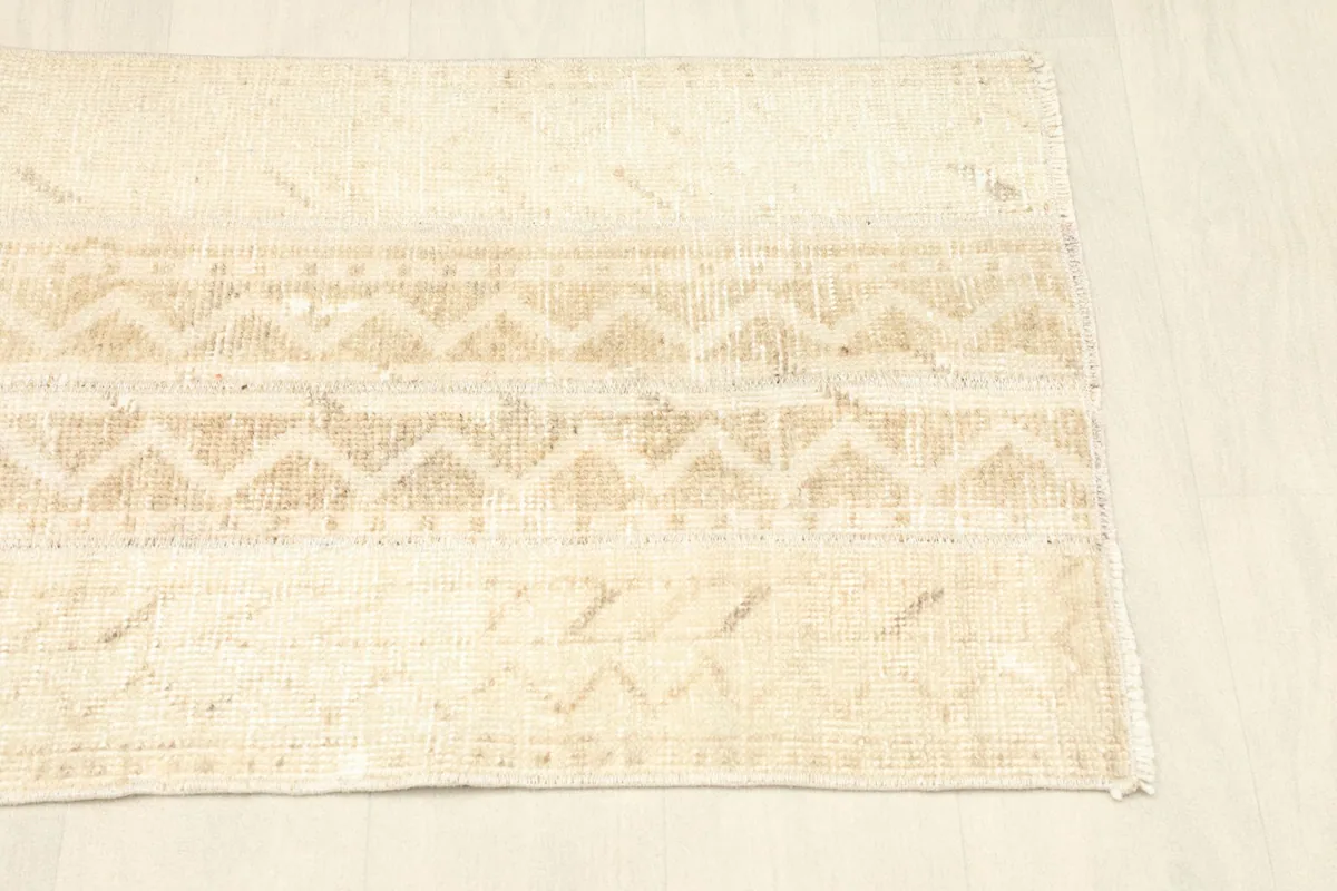 Angled view of the rug's opposite side, showing the full length and design.