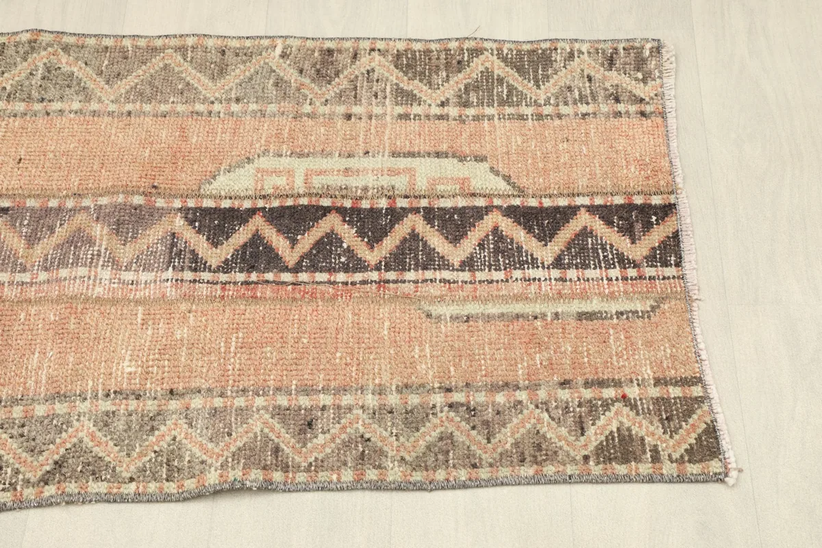 Angled view from the opposite end, revealing the complete pattern repeat and color scheme.