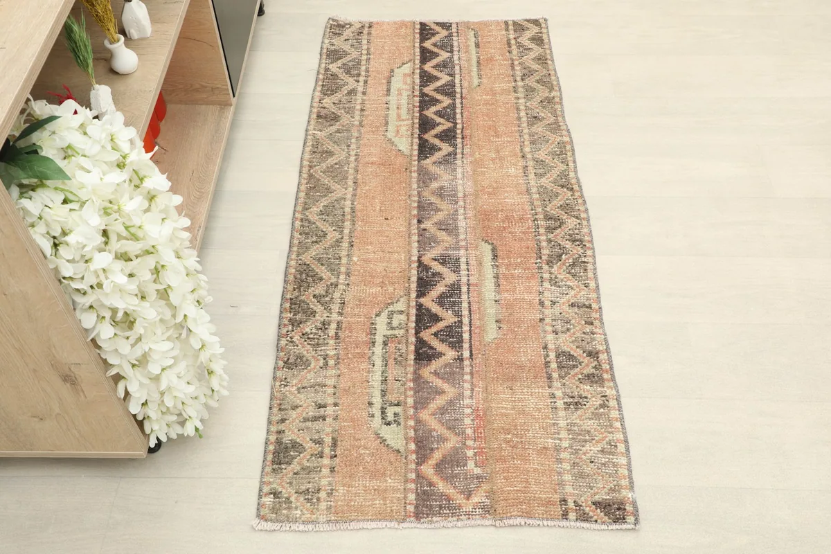 Overhead view showcasing the full length and striped geometric patterns of the Anatolian rug.