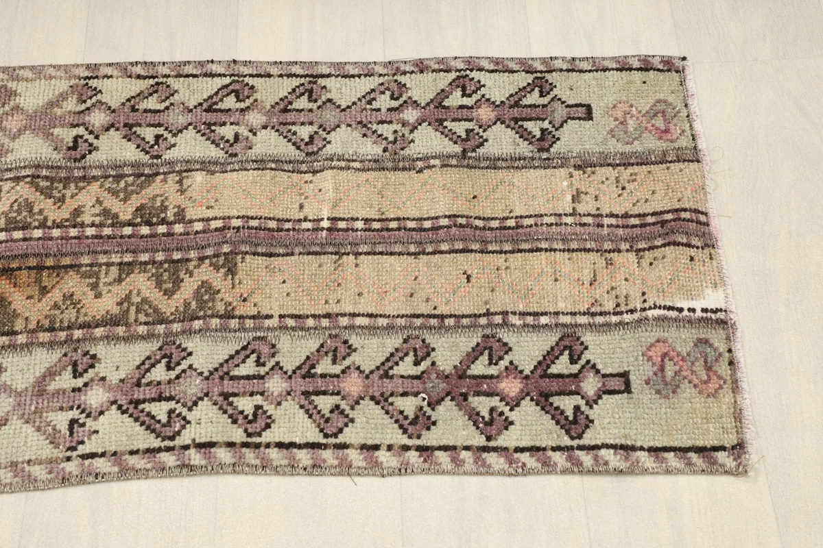 Overhead view of the lower half of the rug, showing slight variations in color and texture.