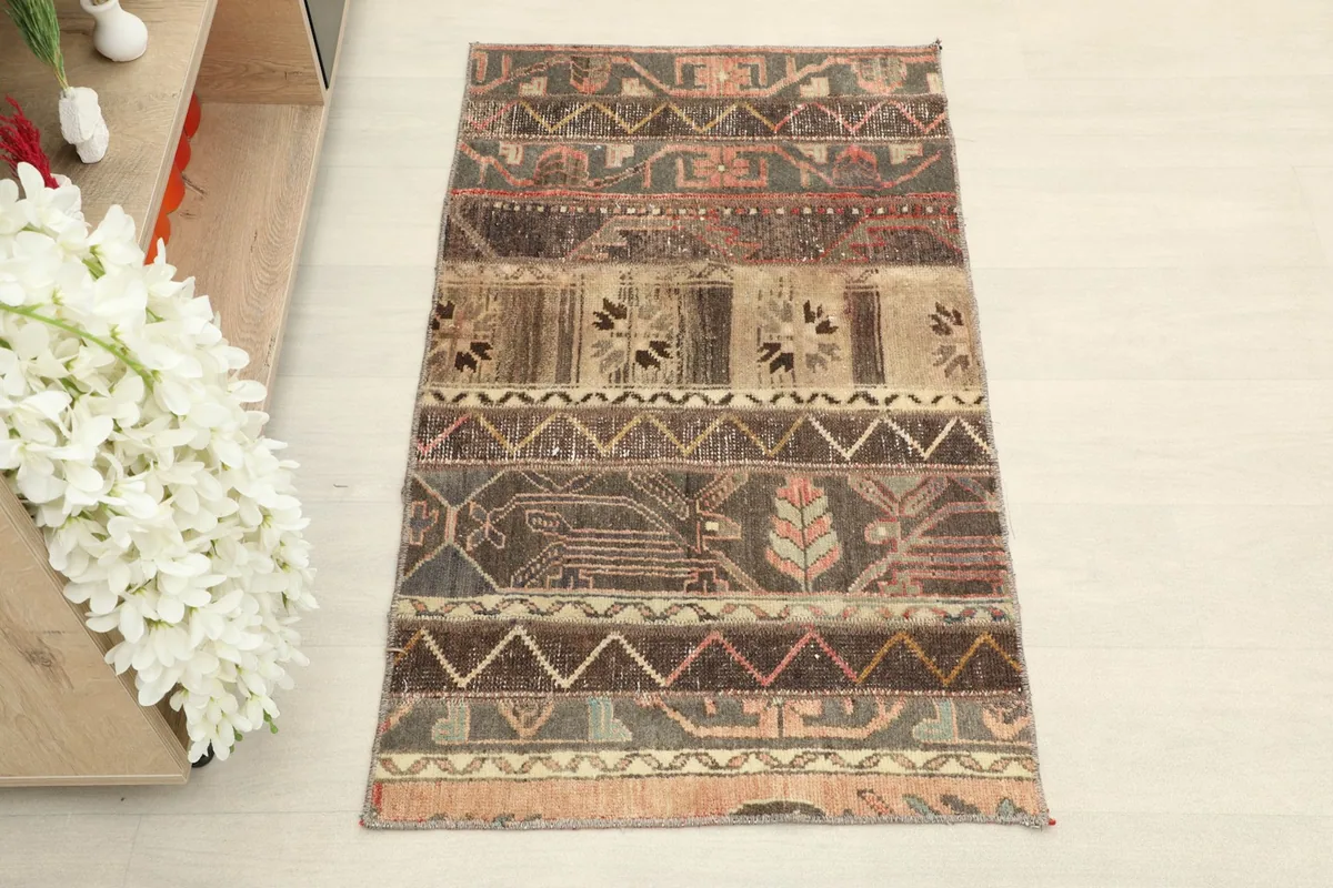 Overhead view showcasing the full design of the brown, gray, and beige rug