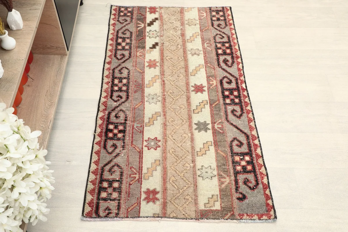 Overhead view showcasing the full pattern and colors of the hand-knotted area rug