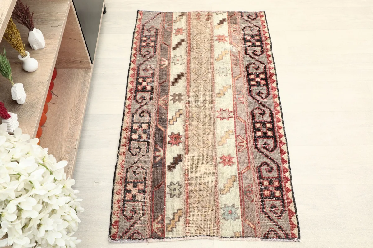 Overhead view of the hand-knotted rug showing full pattern and colors