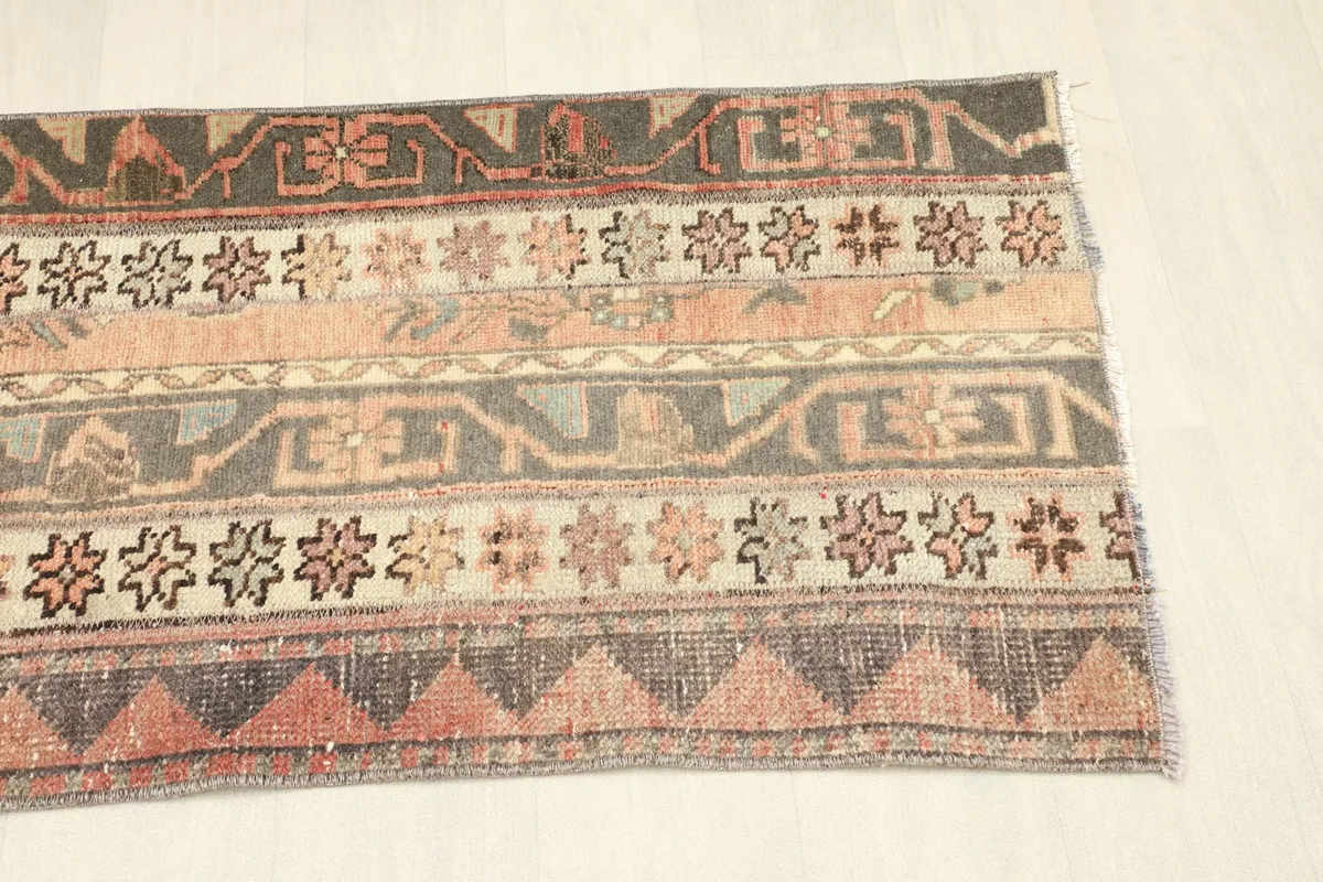 Overhead view of the other end of the runner, showing similar striped and triangular patterns