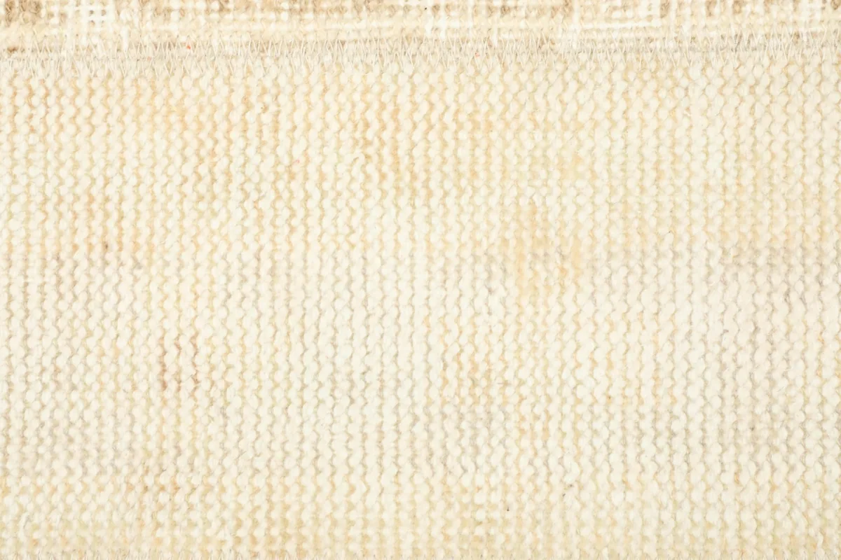 Detailed view of the low wool pile and the hand-knotted texture of the vintage Anatolian runner.