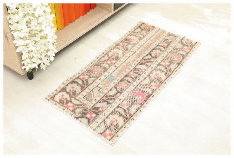 Full top view of the 1'7" x 3'4" hand-knotted vintage Anatolian rug on a white background.