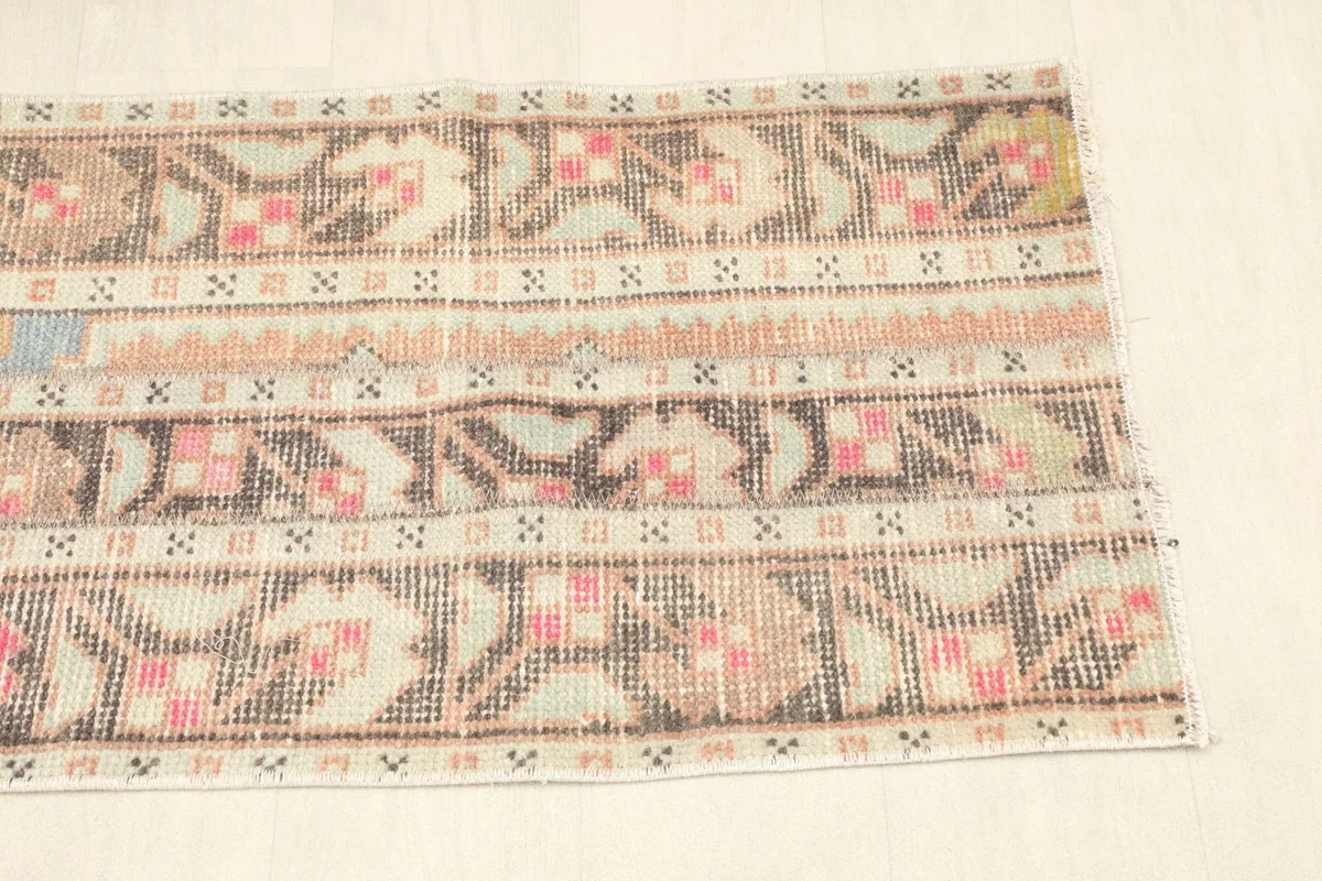 Another overhead shot emphasizing the full pattern repeat and the rug's rectangular shape.