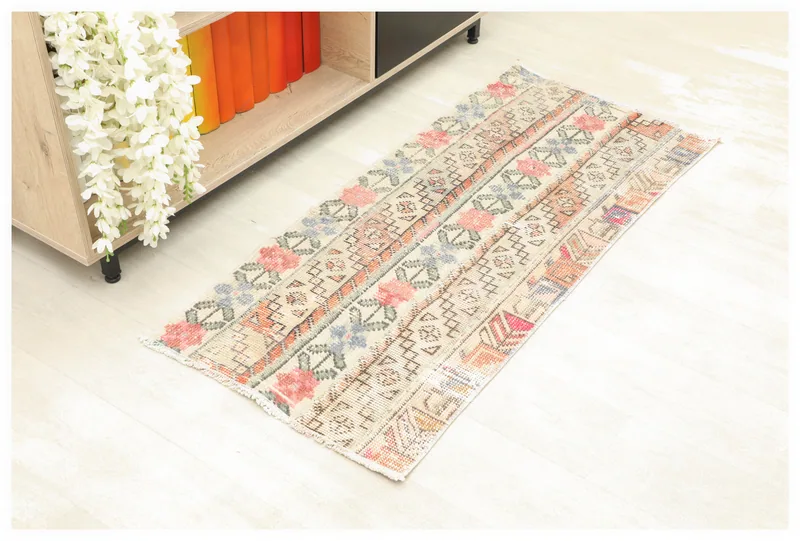 Full top view of the 1'10" x 4'2" beige striped floral runner on a white background.