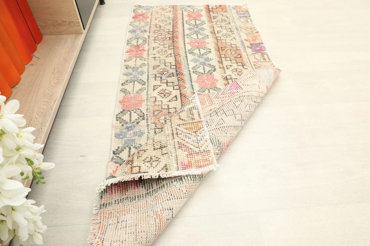 Runner partially folded, revealing the professionally cleaned cotton foundation and woven back.