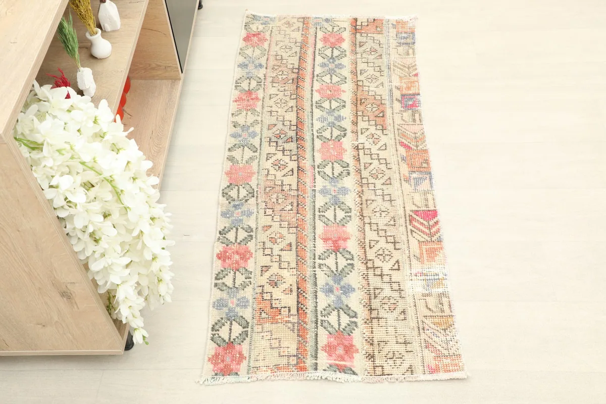 Overhead view of the vintage Anatolian runner, showing its full length and striped pattern.