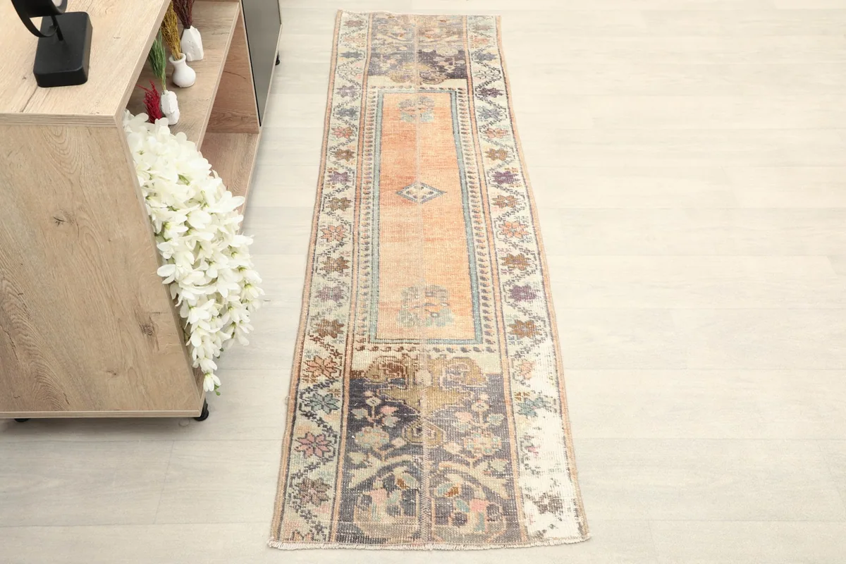 Overhead view of the vintage Anatolian runner rug, highlighting its full length and pattern.