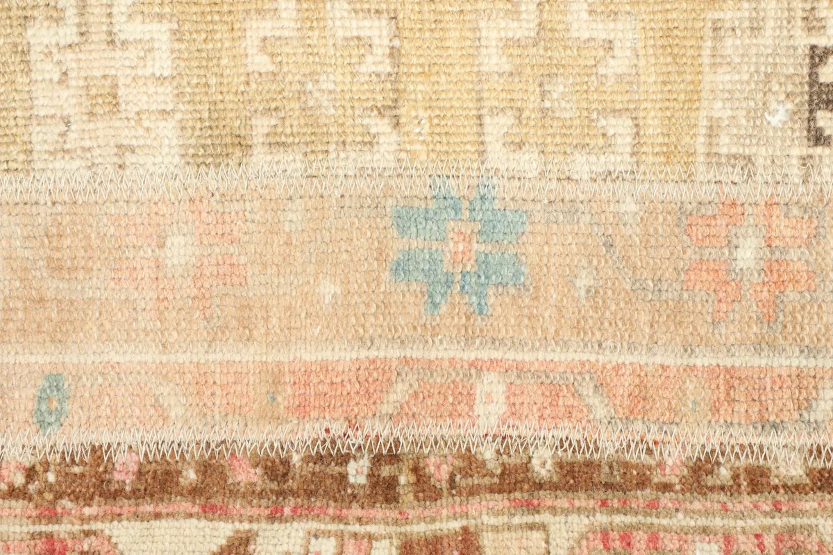 Detailed view of the central field, revealing intricate geometric shapes and color variations.