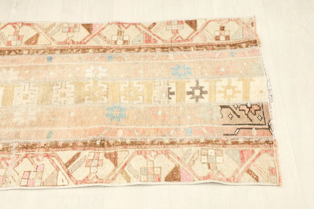 View of the opposite side of the rug, detailing the border and field patterns.
