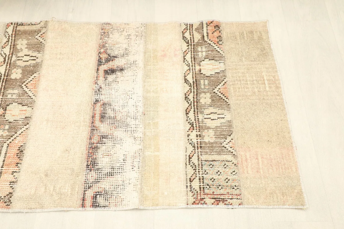 Overhead view from a slight angle, emphasizing the full design and color variation across the rug.