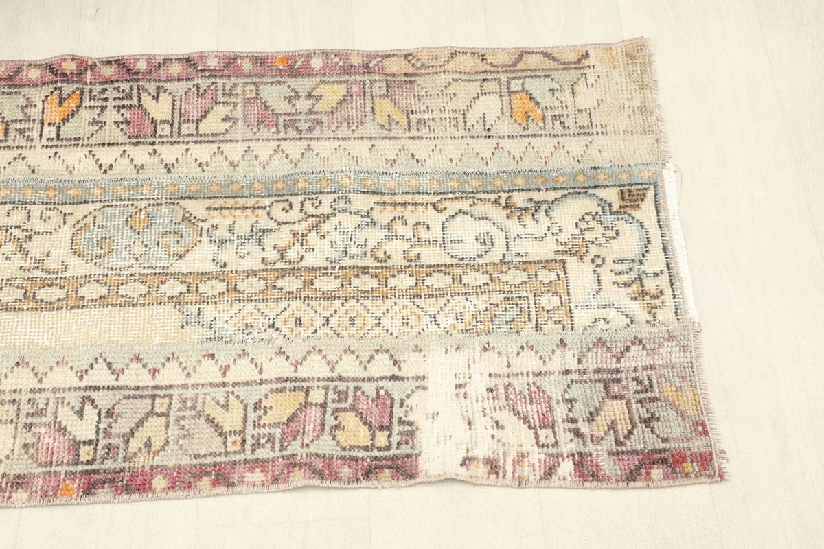 Overhead view of the other end, revealing the unique patchwork-like construction and wear.