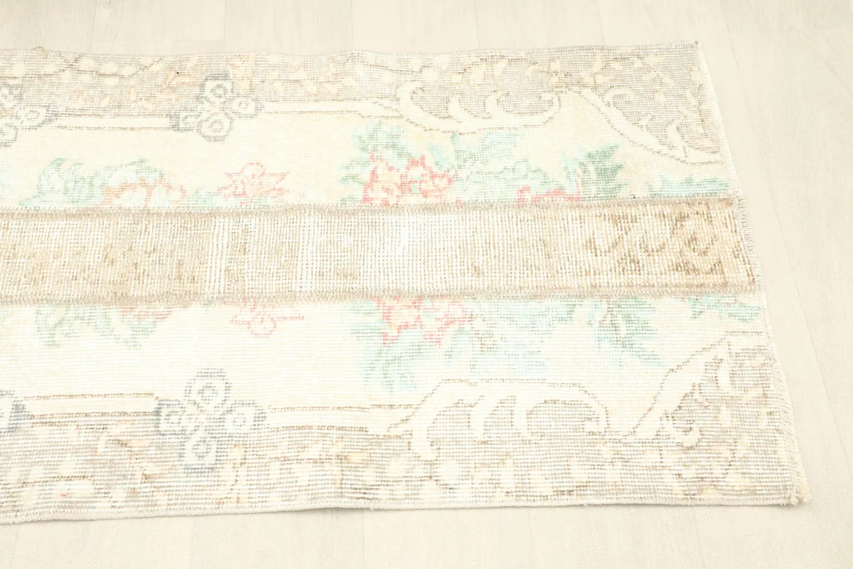 Another angled view from the opposite side, emphasizing the distressed look and unique panel layout.