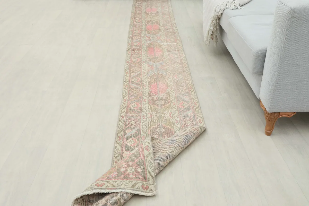 The runner partially folded, showcasing the flexibility and overall appearance of the rug