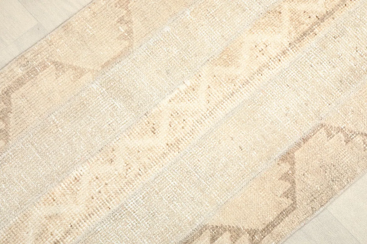Detailed angle view highlighting the striped design and tribal geometric motifs.
