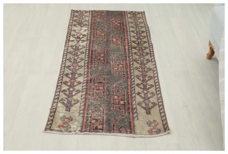 Full top view of the 2x4 vintage Anatolian rug with charcoal and beige colors