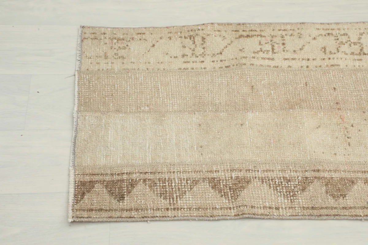 Close-up of the other end of the runner, displaying the striped and geometric design