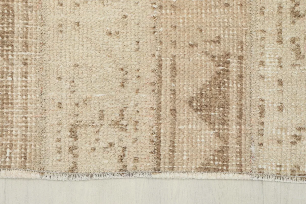 Close-up of the border and fringe, showing the intricate details and finish