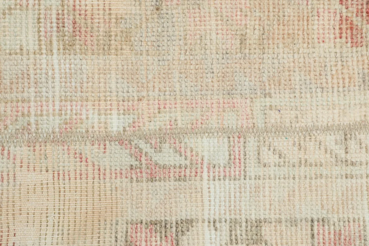 Extreme close-up showing the individual knots and texture of the wool pile.