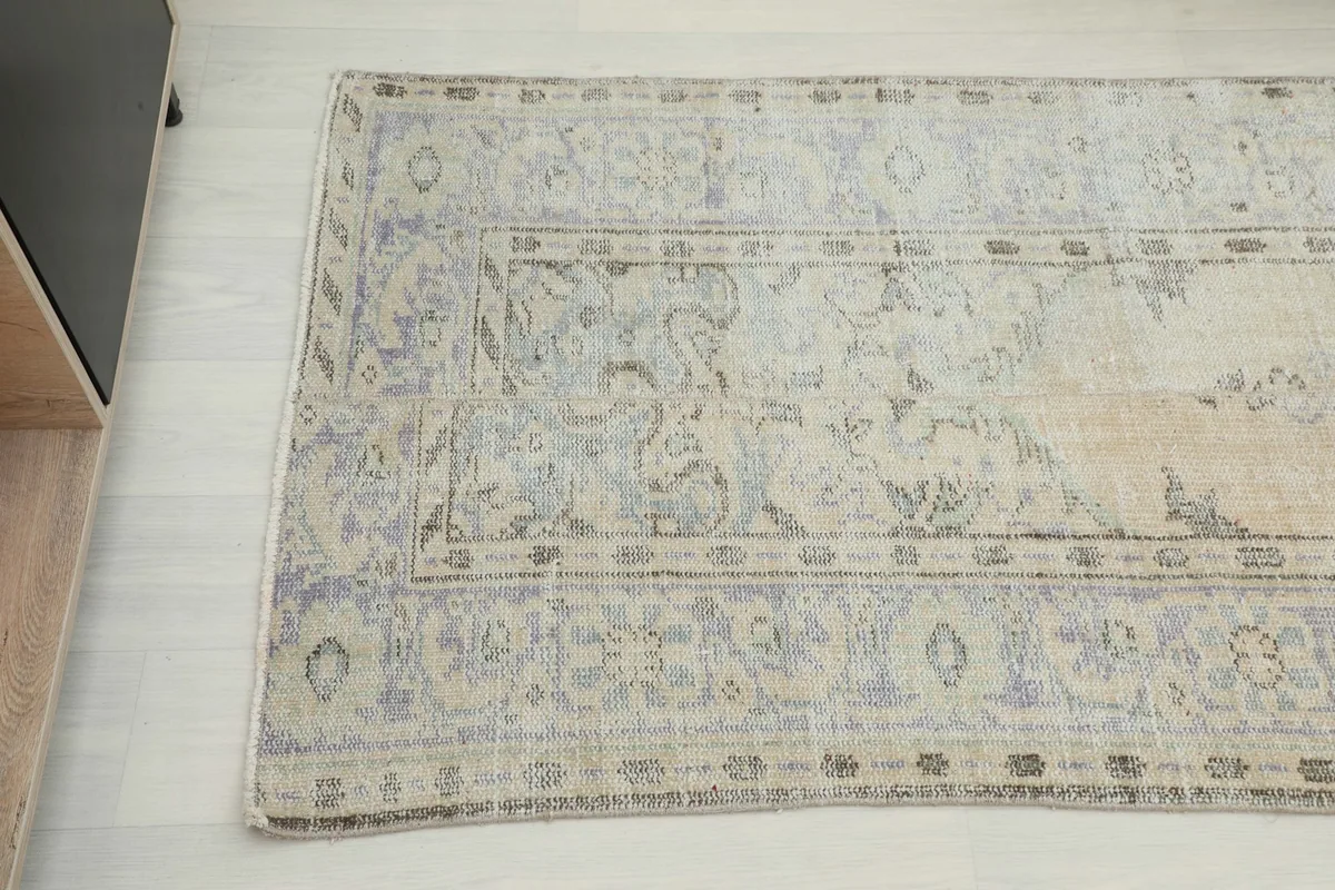 Overhead angle view of one end of the runner, displaying the softened geometric patterns.