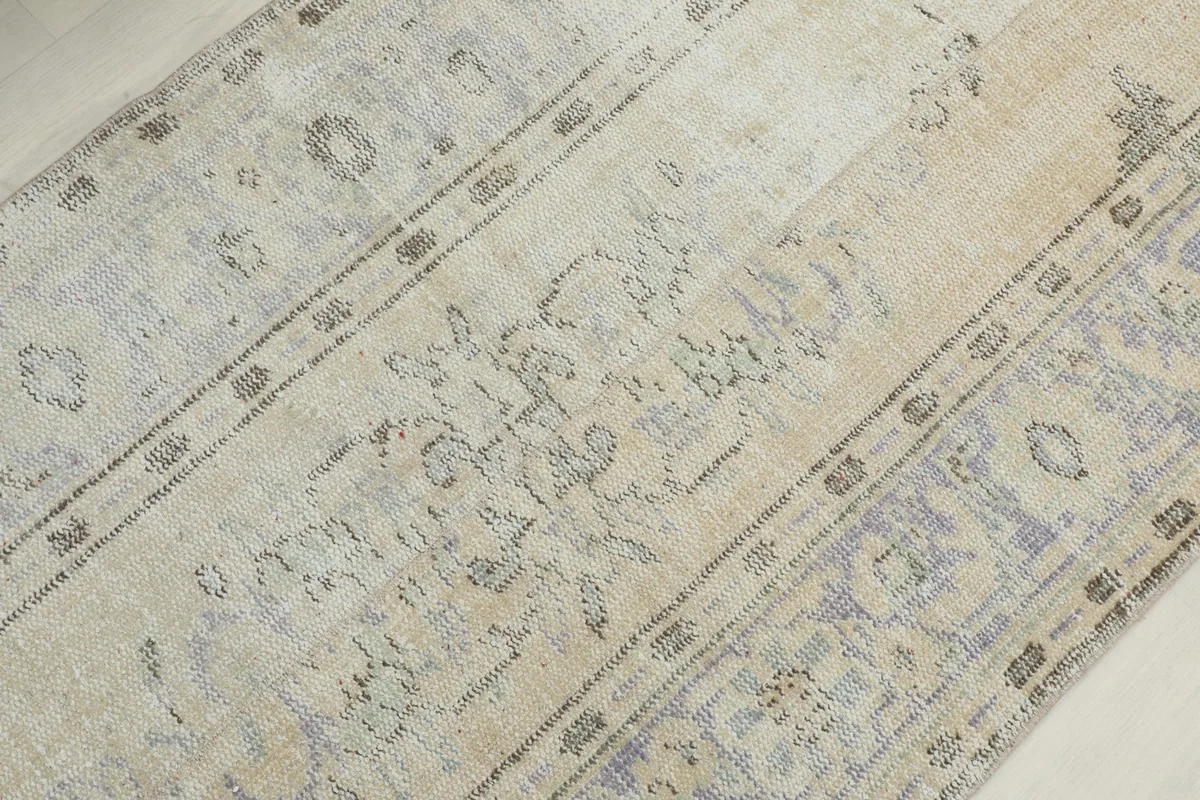 Overhead view of the central part of the runner, showing areas of natural wear and patina.