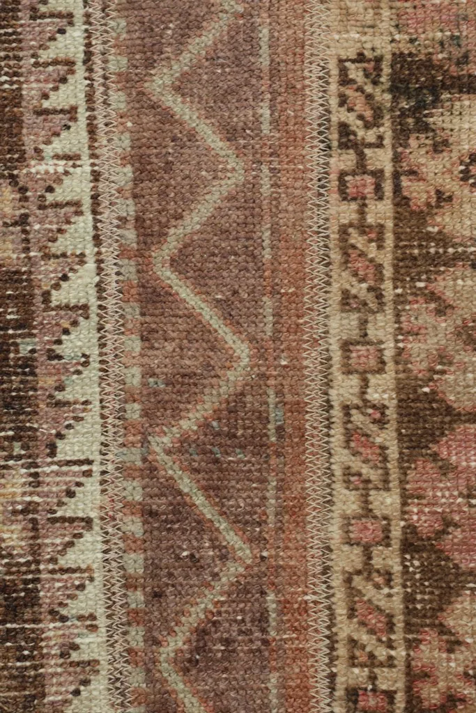 Overhead close-up highlighting the zigzag and rectangular motifs in the center stripe