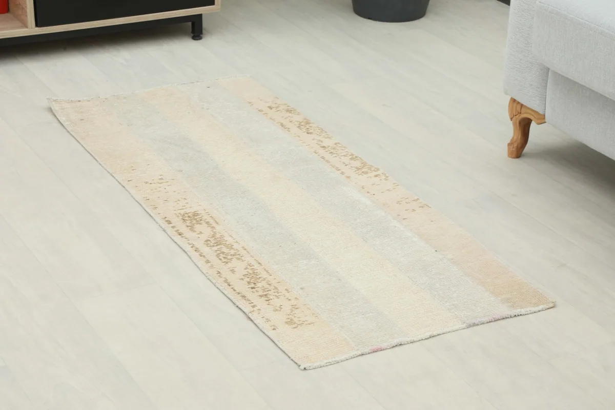 Angled view of the vintage Anatolian rug on a light-colored floor