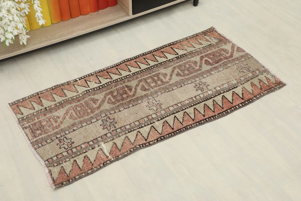 Slightly angled overhead view capturing the full length of the vintage Anatolian rug